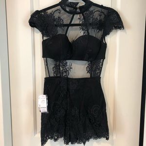 BEBE’s black lace romper !